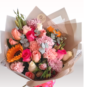 BOUQUET TANIA ROSAS, GIRASOLES Y FLORES MIXTAS